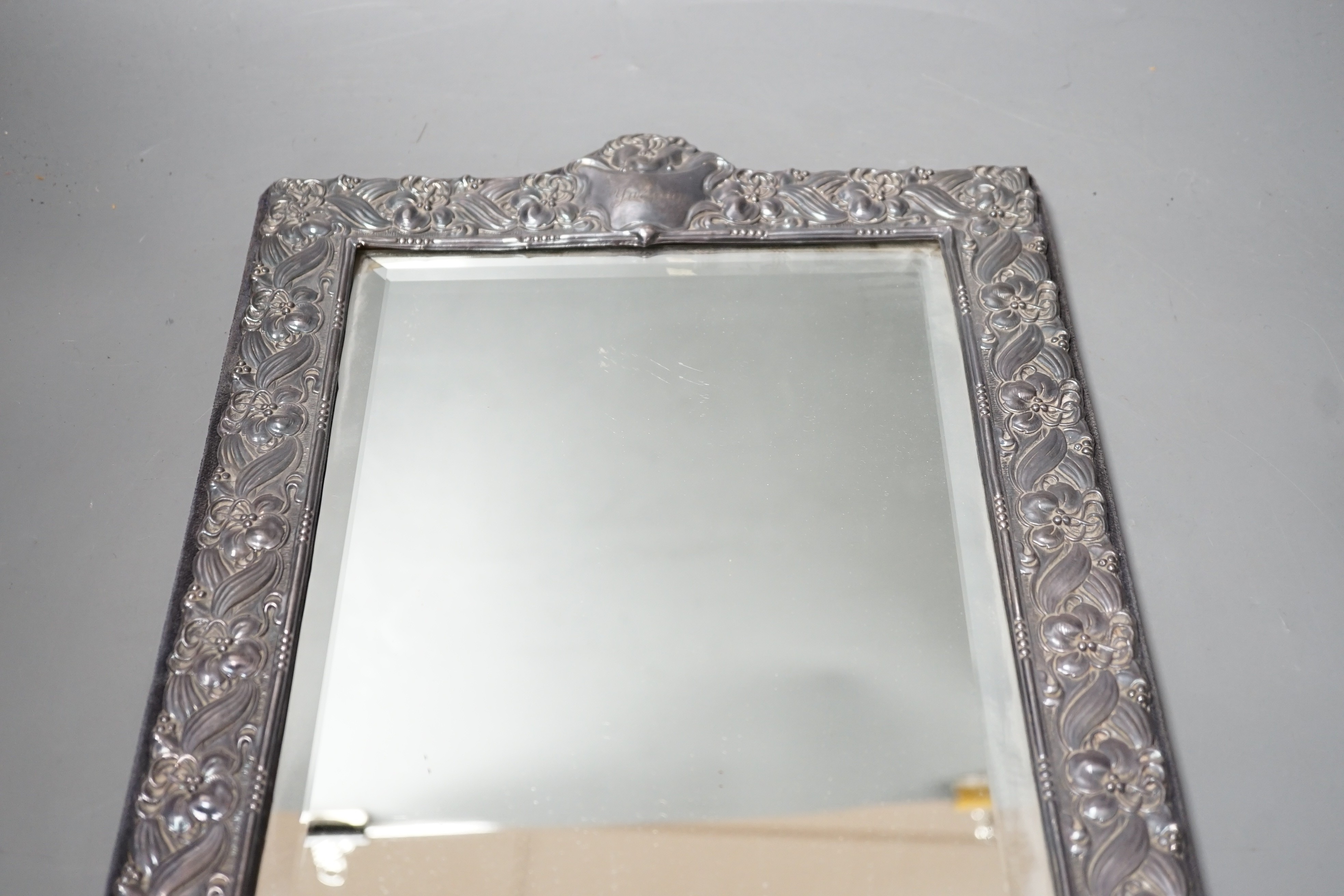 A modern repousse silver mounted rectangular photograph frame, Keyford Frames Ltd, London, 1988, 36.6cm.